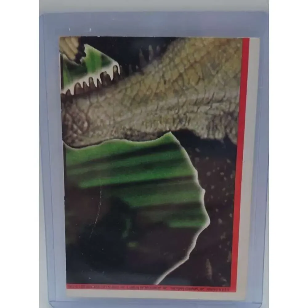 1993 Topps Jurassic Park Gold #69 Rex vs. the Raptors Card